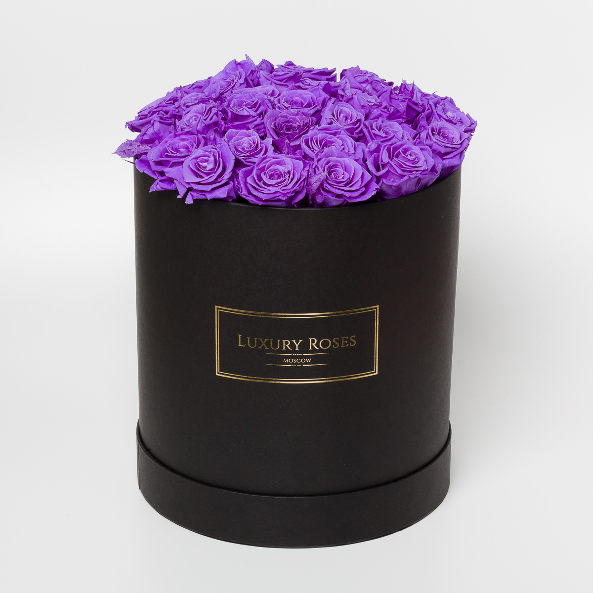 Luxury rose. Букет в фиолетовой коробке. Букет в шляпной коробке сиреневого цвета. Фиолетовые букеты цветов в коробке. Фиолетовые розы в коробке.